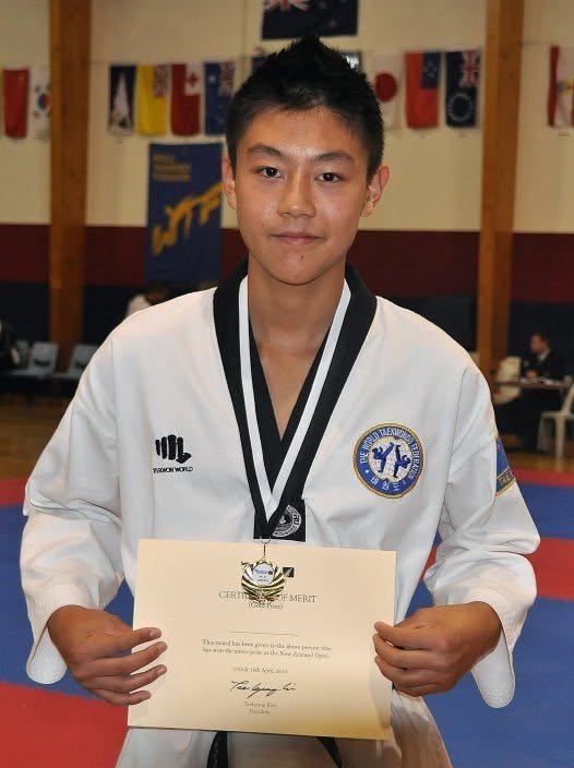 Josh winning gold at the Oceania Taekwondo Championships